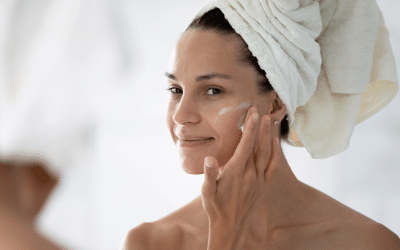 Woman Applying An Acne Treatment