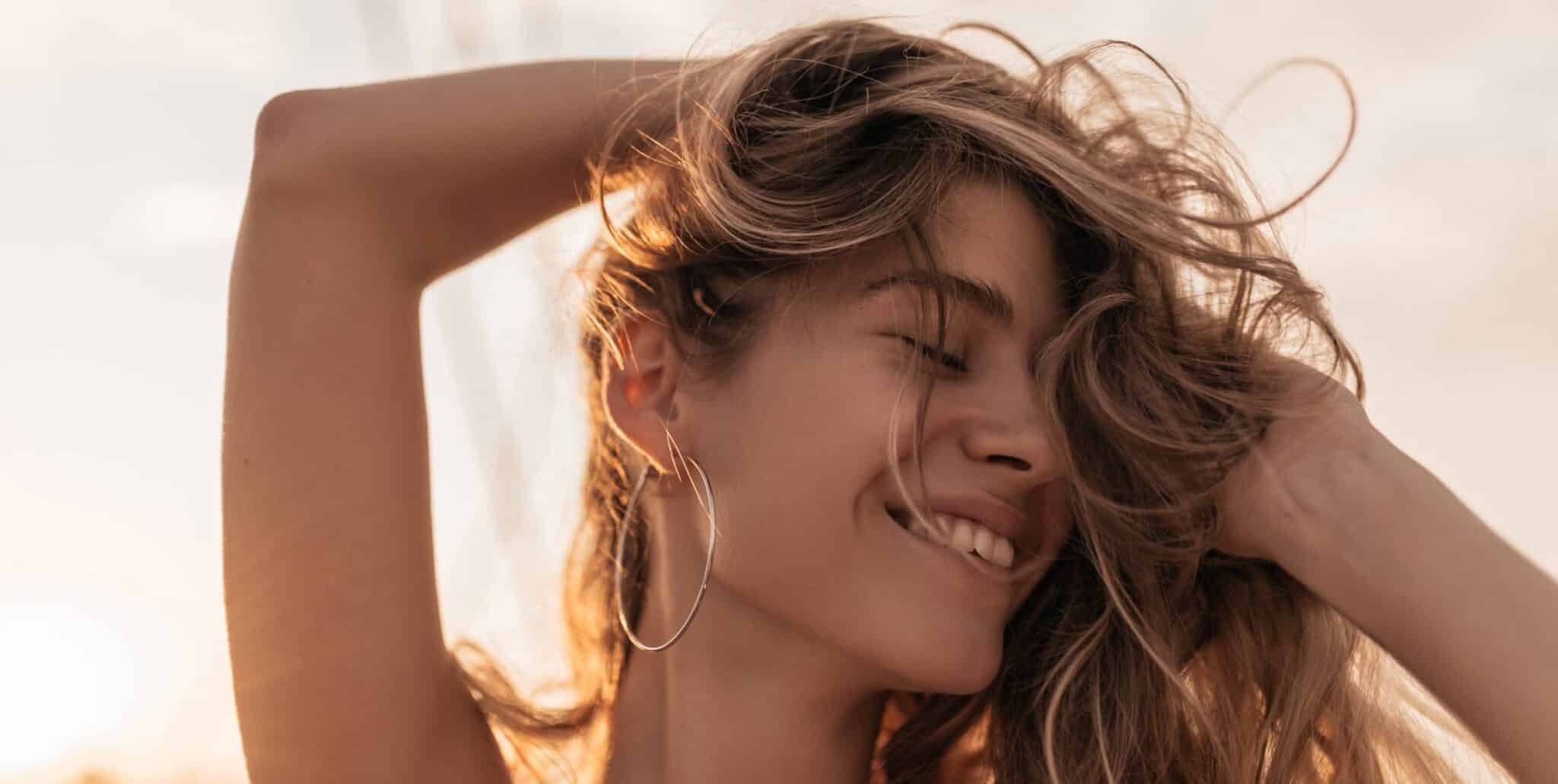 Happy young woman with healthy skin