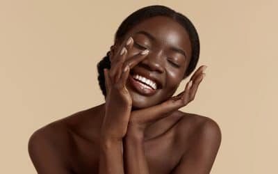 A Woman Rubbing Her Smooth Facial Skin