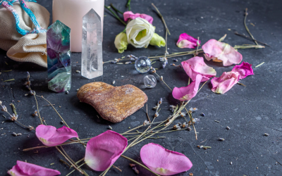 A Heart-shaped Stone Surrounded By Romantic Items